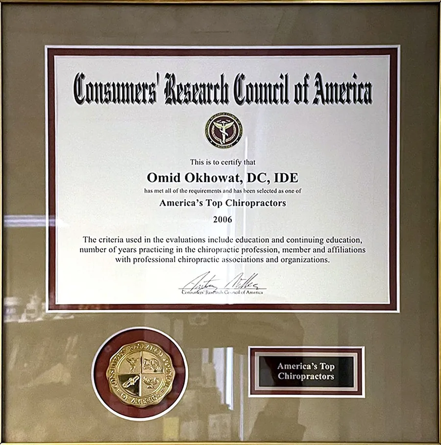 Framed Consumers' Research Council of America plaque naming Omid Okhowat among America's Top Chiropractors