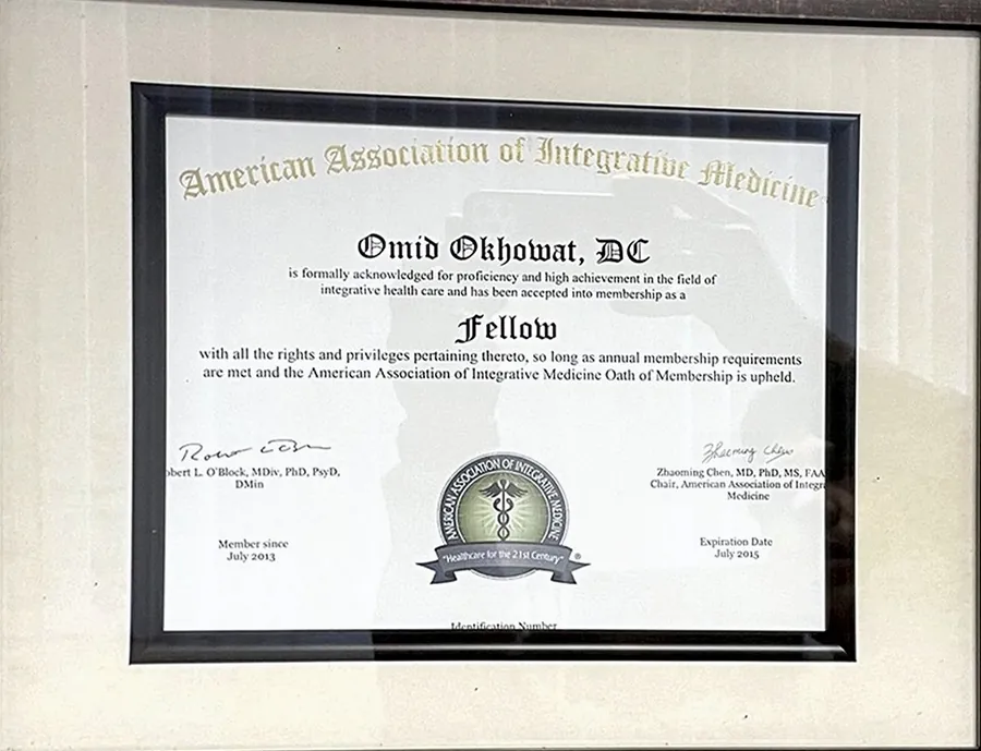 Framed Fellow certificate from the American Association of Integrative Medicine for Omid Okhowat, DC