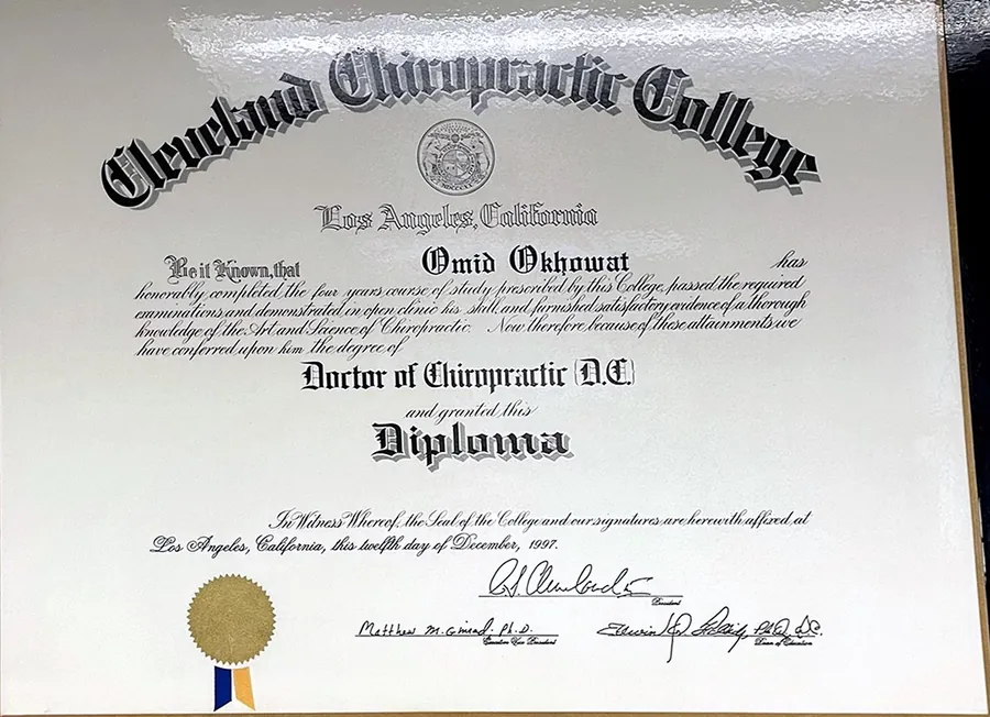 Framed Doctor of Chiropractic diploma from Cleveland Chiropractic College, Los Angeles, awarded to Omid Okhowat